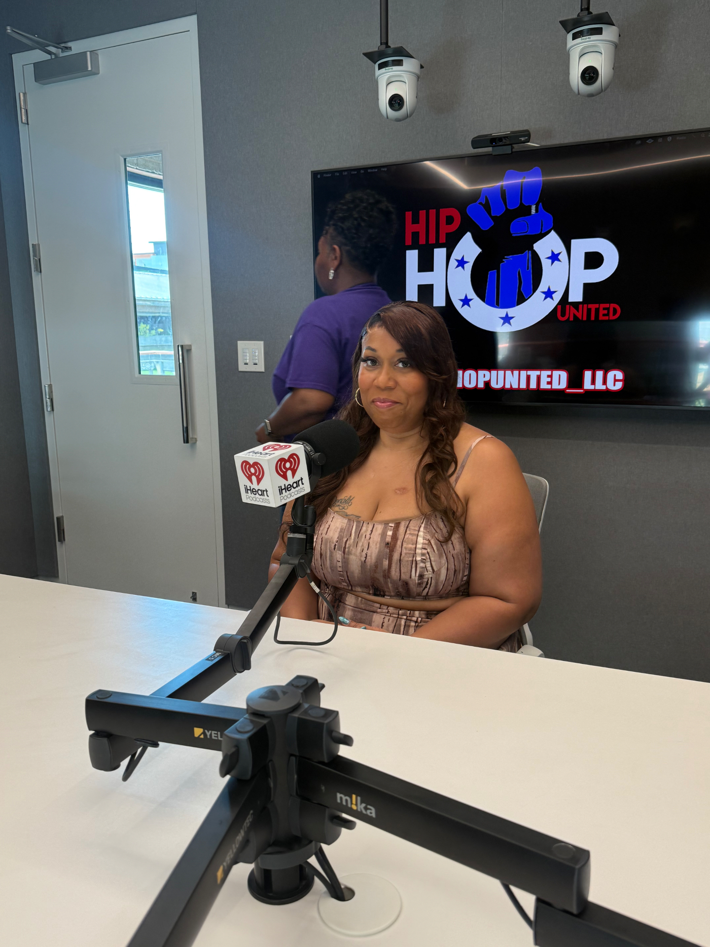 Summer Grays speaking about Indy Bosses in a podcast studio